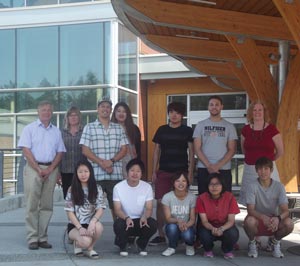 College of the Rockies President David Walls and Executive Director, International and Regional Development Patricia Bowron celebrate the College’s success with a group of international students and instructor Annette Aarts.
