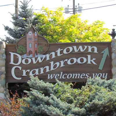 Stone and wood make up the Downtown Cranbrook sign that welcomes visitors