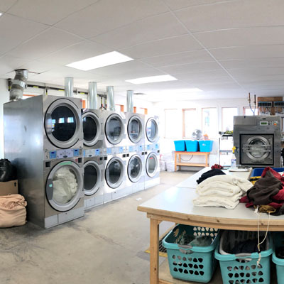 Inside view of the washers and equipment at East Kootenay Regional Laundry. 