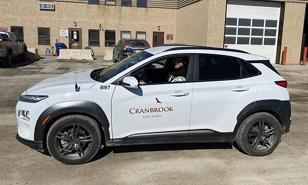 Evan Berry, energy conservationist for the City of Cranbrook, takes a ride in the City’s first electric vehicle.