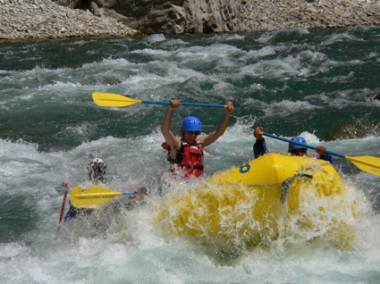 Person white water rafting