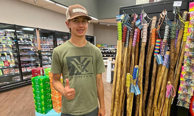 Ethan Dortman with walking stick display. 