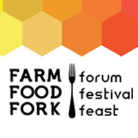 A banner lists details on dates for the Farm, Food, Fork event. Behind it is colourful honeycomb. 