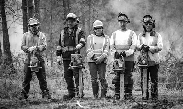 Group of firefighters, b&w photo. 
