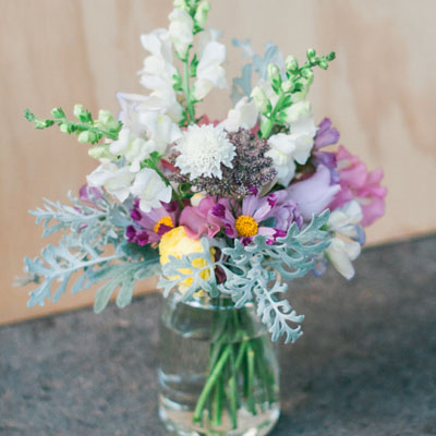 Pretty bouquet of flowers in a clear glass vase. 