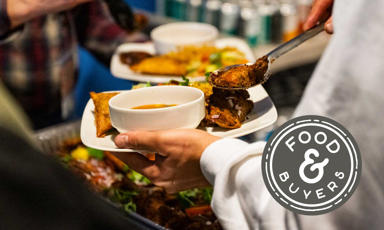 Close-up of people serving food