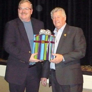 Cranbrook's newest Citizen of the Year, Frank Vanden Broek, was presented with a gift by Mayor
Lee Pratt.