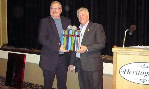 Cranbrook's newest Citizen of the Year, Frank Vanden Broek, was presented with a gift by Mayor
Lee Pratt.