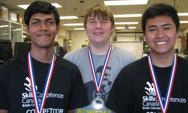 MBSS students Ravinder Ranasinghe, Adam Webster and Joshua Zamora are 2015 Skills Canada B.C. gold medal winners in robotics.