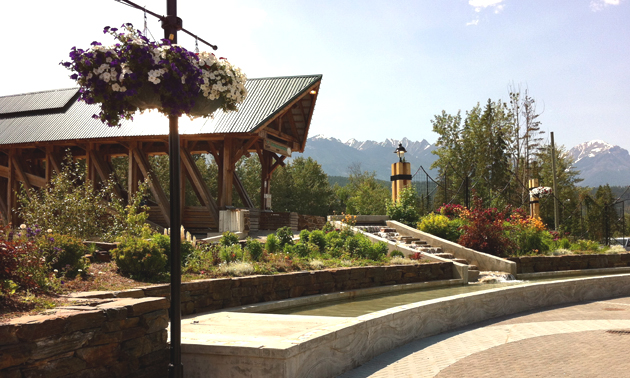 Scenic view of Golden showing park scene, bridge and distant mountains. 