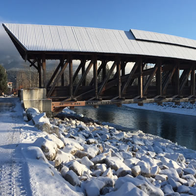 The Kicking Horse River pedestrian bridge has undergone a significant restoration to replace rotting timbers and prevent further water damage.