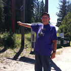 Tom Lymbery of the Kootenay Lake Chamber of Commerce points to the now closed Gray Creek Pass.