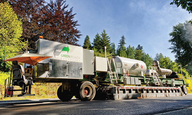 Green Roads Recycling asphalt machine. 