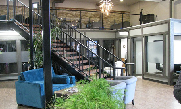 Ground Floor Co-Working space showing stairs and upstairs offices. 