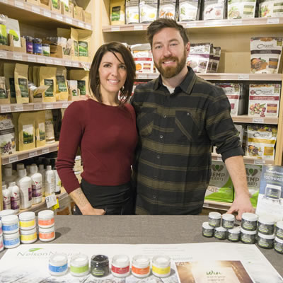 Dana DiPonio and Kevin Hagel are shown in a health food store. They are co-owners of Nelson Naturals, producing a natural toothpaste.