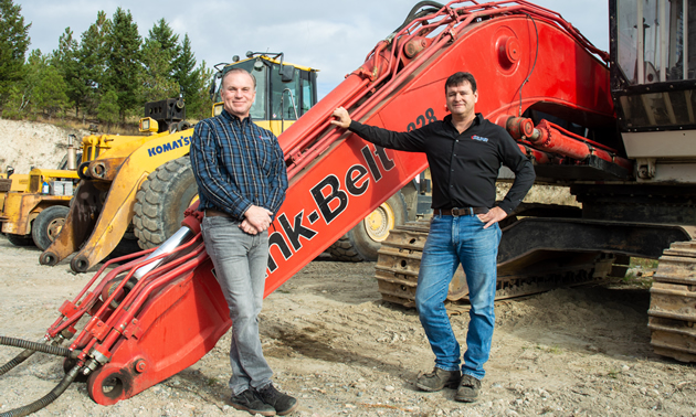 Caliper Machine & Hydraulics owner Mike Hambalek (left) and Troy Ross, Caliper GM, are shown here with some of the heavy equipment that comes to them for repair.