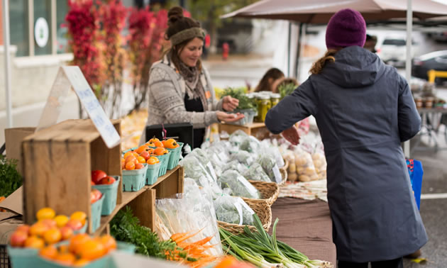 Happy Hills Farm's booth at the local farmers market