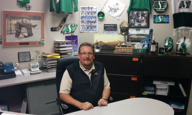 Collin Johnston manages Cranbrook’s Heritage Inn. He’s quick to point out his Saskatchewan Roughrider memorabilia, which you’ll see if you step inside his office.
