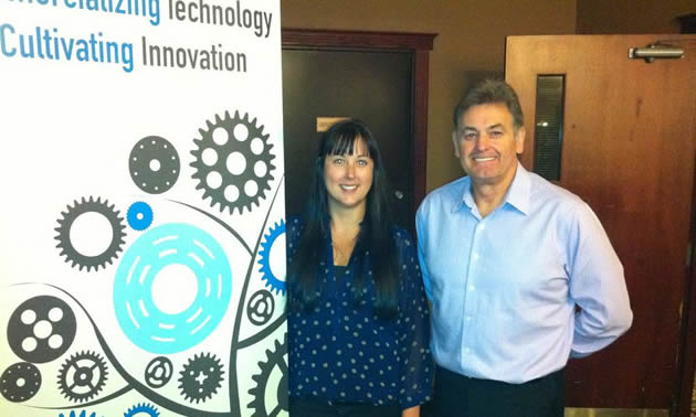 KRIC's Tara Penner poses with sales trainer Ian Selbie after his sales seminar, The 7 Deadly Sins of Selling