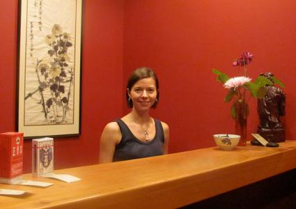 Woman at a front desk of an office