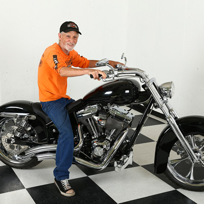 Jerry Wood beams from the seat of his shiny Harley-Davidson-powered motorcycle, custom-built by Wheelz of Fruitvale, B.C.