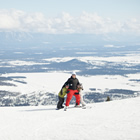 Photo of a guy with his kids at Kimberley Alpine Resort