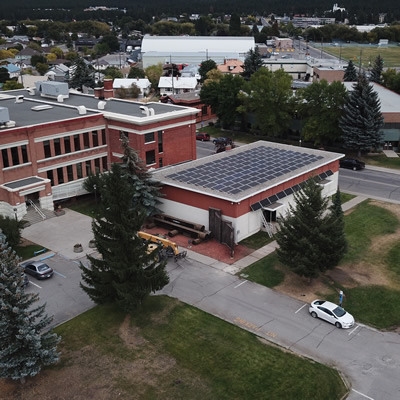 Aerial view of the solar power installation on the roof of the Ktunaxa Nation Council auditorium.