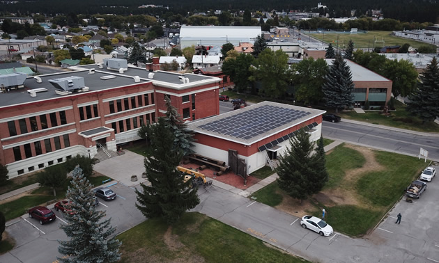 Aerial view of the solar power installation on the roof of the Ktunaxa Nation Council auditorium.