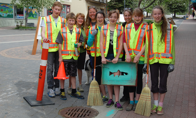 Grade 8 students paint the town for fish to help keep their local watershed healthy.