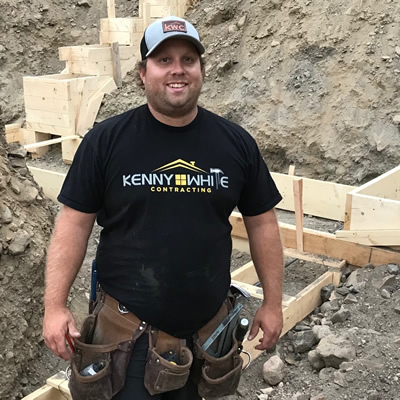 Kenny White of Kenny White Contracting in Montrose, B.C., is shown here at the foundation of a building site 