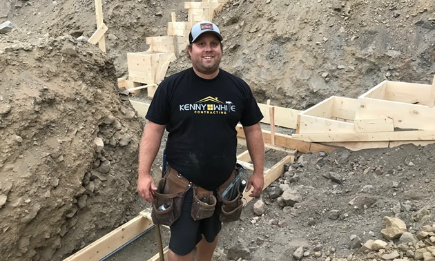 Kenny White of Kenny White Contracting in Montrose, B.C., is shown here at the foundation of a building site 