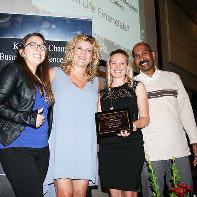 (L to R) Bronte Dickson of Kootenay Business magazine presents the Professional Services Award to Sun Life Financial’s Karly Berry and Rachelle Colthorp, with Kimberley chamber director Thomas Datt