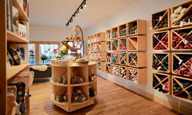 Shelves of colourful yarns fill the Knitty Gritty shop.