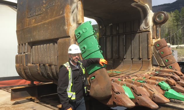 Regional Manager, Steven Drost, with a massive shovel repair.