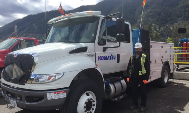 Steven Drost with a new Komatsu service truck.