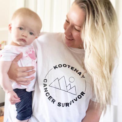 Karli and her daughter, Karli is wearing a Kootenay Cancer Survivor t-shirt. 