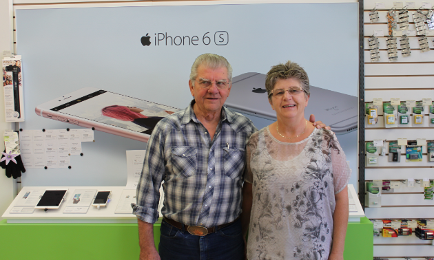 Irvin and Evelyn Sobry pose inside their store, Lectric Avenue Electronics.