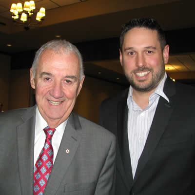 Peter Legge (L), prolific author and chairman and CEO of Canada Wide Media, is pictured here with Chris Botterill, president of the Cranbrook Chamber of Commerce.