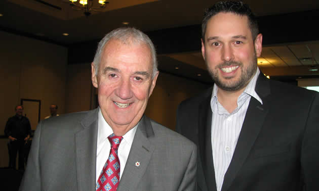 Peter Legge (L), prolific author and chairman and CEO of Canada Wide Media, is pictured here with Chris Botterill, president of the Cranbrook Chamber of Commerce.
