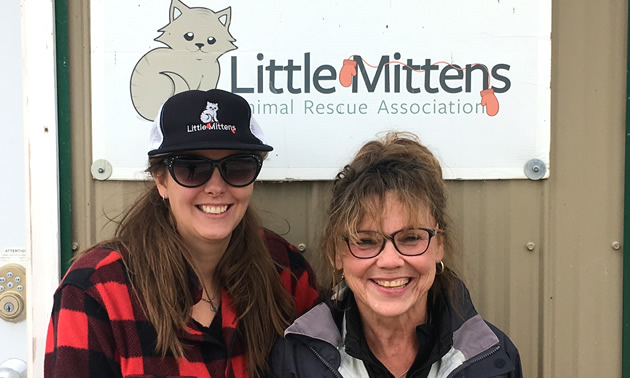 Alannah Knapp and volunteer Linda Niemi stand in front of the Little Mittens Animal  Rescue Association's building.