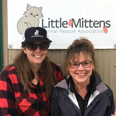 Alannah Knapp and volunteer Linda Niemi stand in front of the Little Mittens Animal  Rescue Association's building.