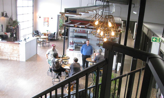 Ground Floor chat space, looking down from top staircase. 