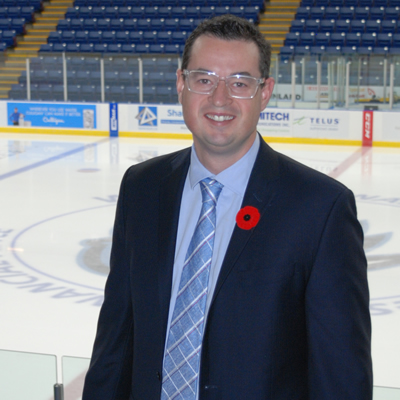 Matt Cockell, the president, general manager and co-owner of the Kootenay Ice Hockey Club, with the empty ice in the background 