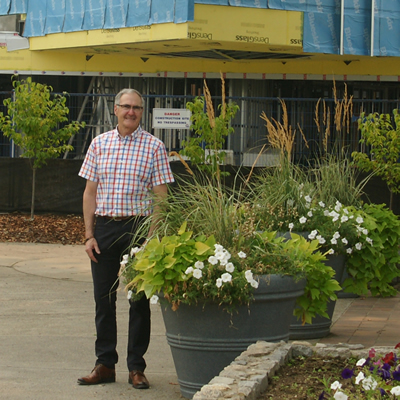 Mike Martin, mayor of Trail, B.C., admires the architectural design of the Riverfront Centre, which is scheduled for completion by year's end.