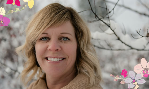 A headshot of Monica Swagar with snow in the background
