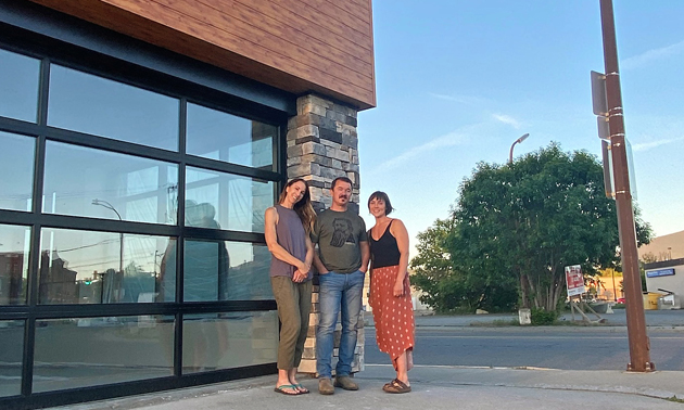 (L to R) Corinna Robinson, Mike Robinson and Christel Hagn stand in front of the Morchella Market building. 