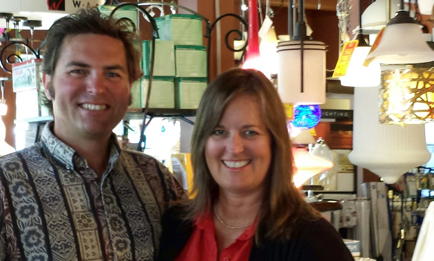 Michael Flood and Carol Pears stand inside their business, Mountain High Lighting Designs in Castlegar, B.C.