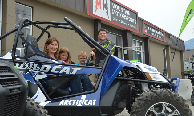 Kim and Aaron Bernasconi (with their kids Bella and Ben), owners of Mountain Motorsports and Golden Snowmobile Rentals in Golden, B.C. 
