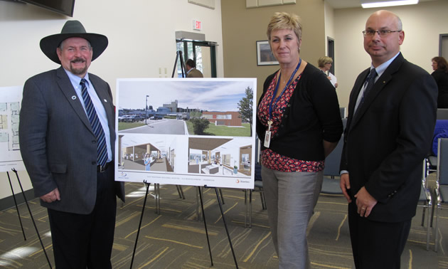 KERHD Chair John Kettle and representatives from Interior Health reveal the conceptual drawings for the new ICU project during a recent KERHD Board meeting.