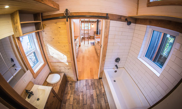 A full-size bathroom in a tiny home by Nelson Tiny Houses. 